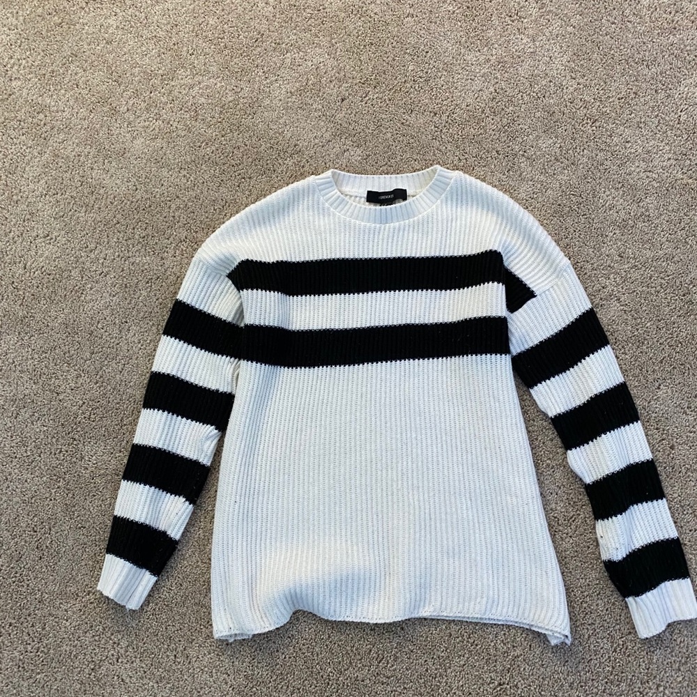 white and black sweater